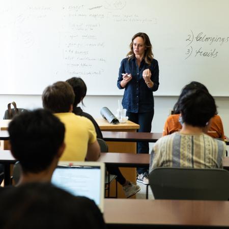 BBA students sitting in classroom listening to professor