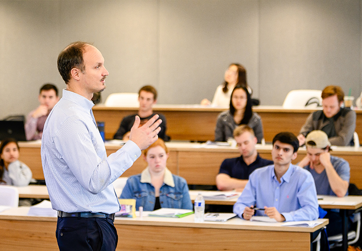 Instructor gestures while speaking to class