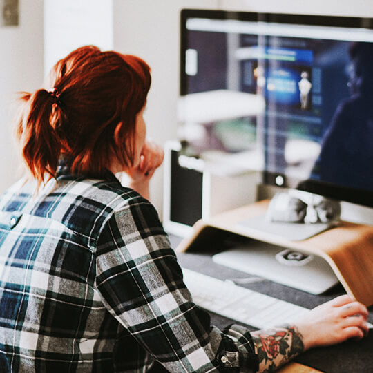 Back of person working on computer