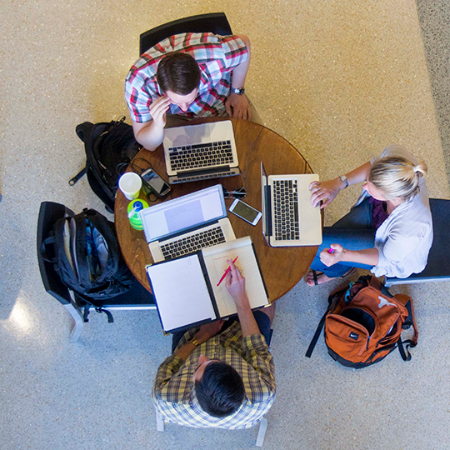 students studying at a table