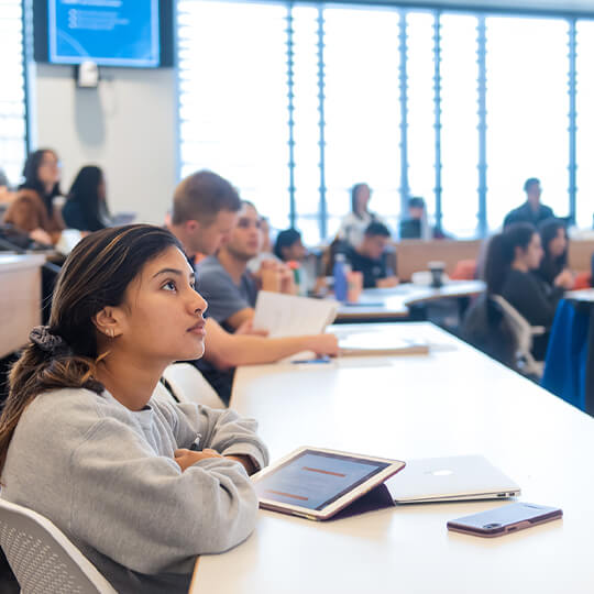 MS Program student listens in class